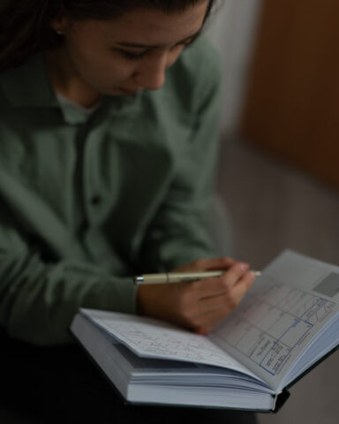 a girl using a planner