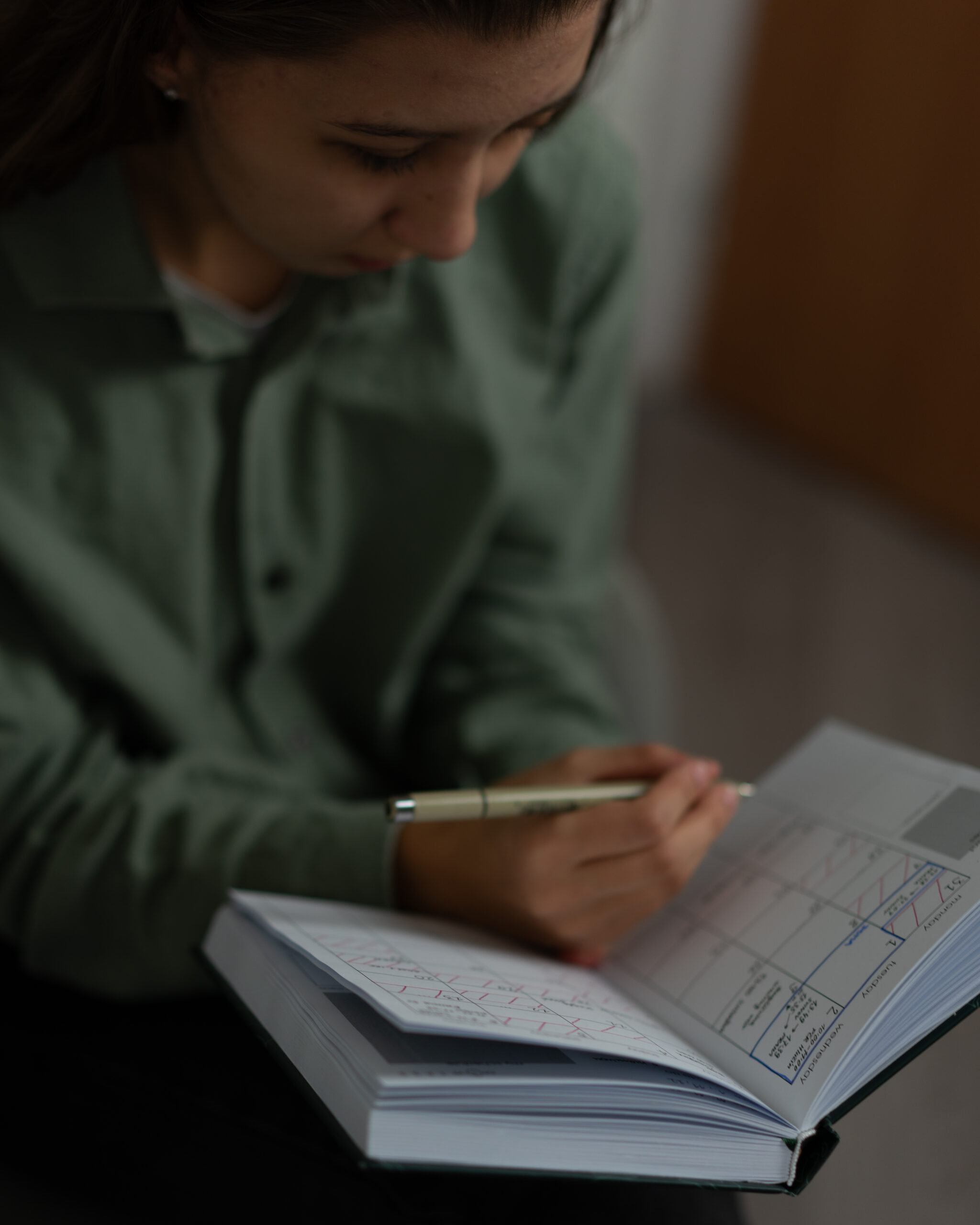 a girl using a planner